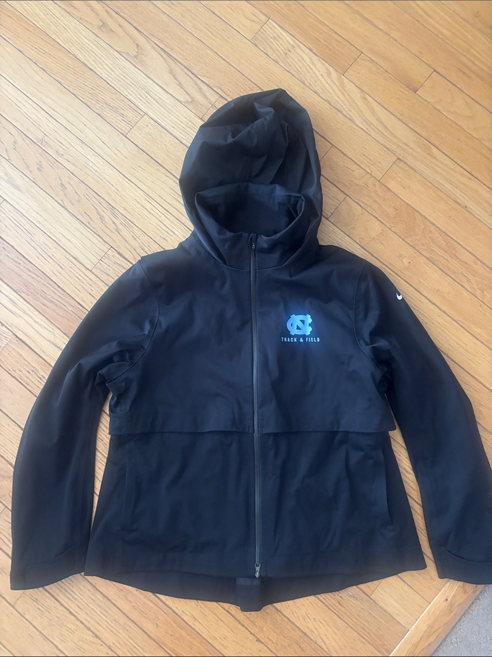 Nike Black Hooded Track Jacket with Light Blue UNC Emblem